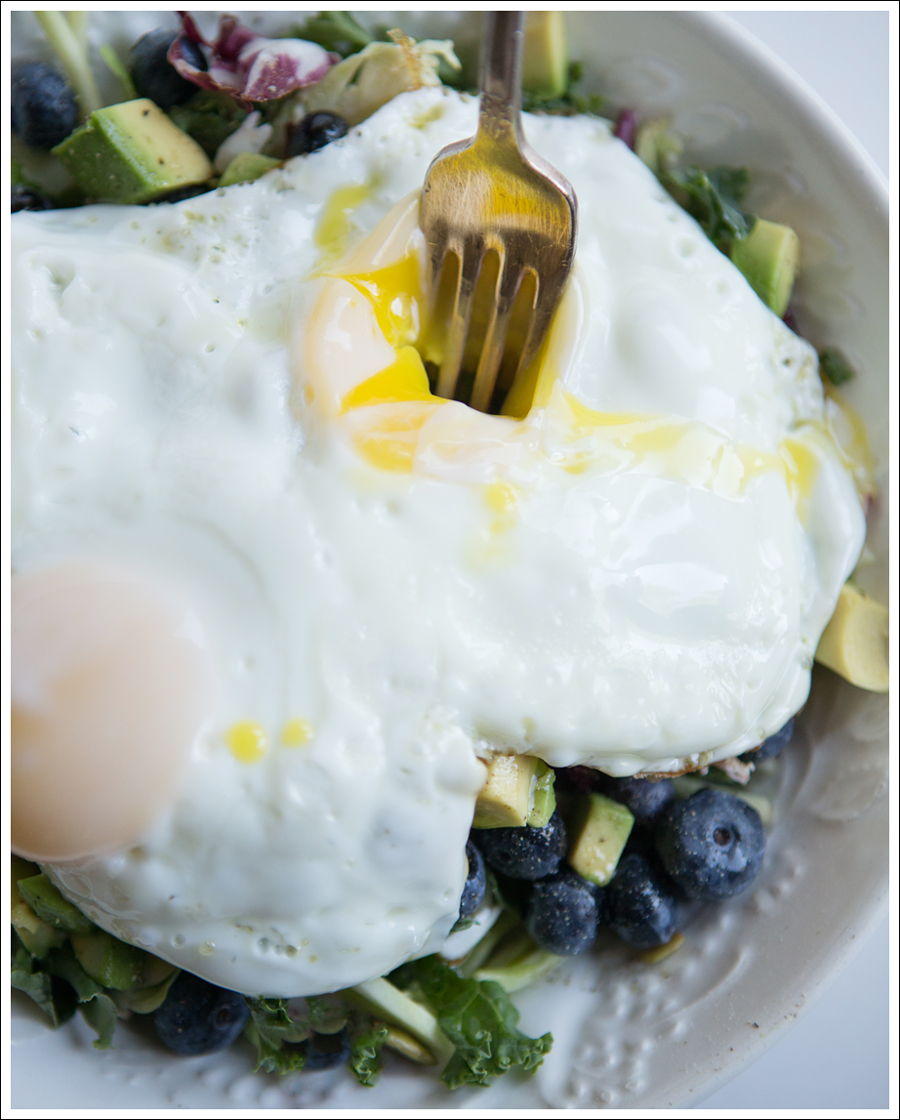 Blog Paleo Kale Broccoli Brussel Sprout Salad with Blueberries Avocado topped with a Fried Egg-2